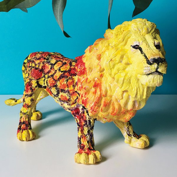 LIONS Figurines Yellow with Black Spots